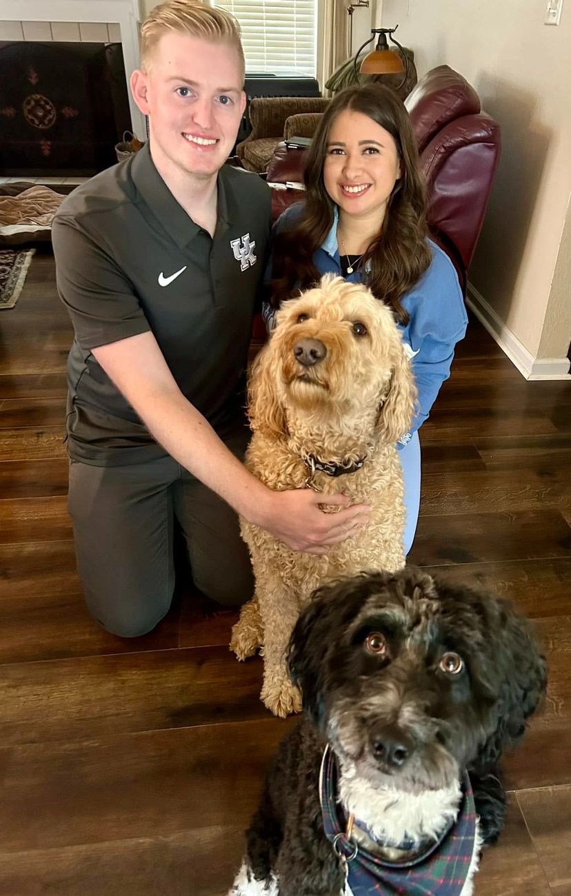 Allison and Daniel at home with their two dogs