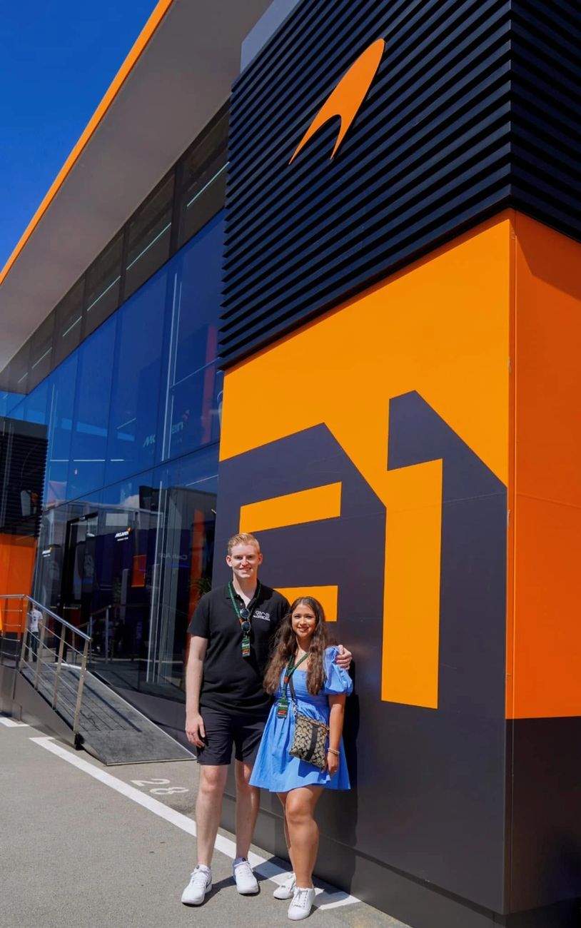 Allison and Daniel outside the McLaren hospitality unit in the F1 paddock
